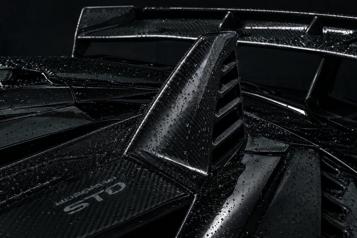Water beading on coated black Lamborghini paint